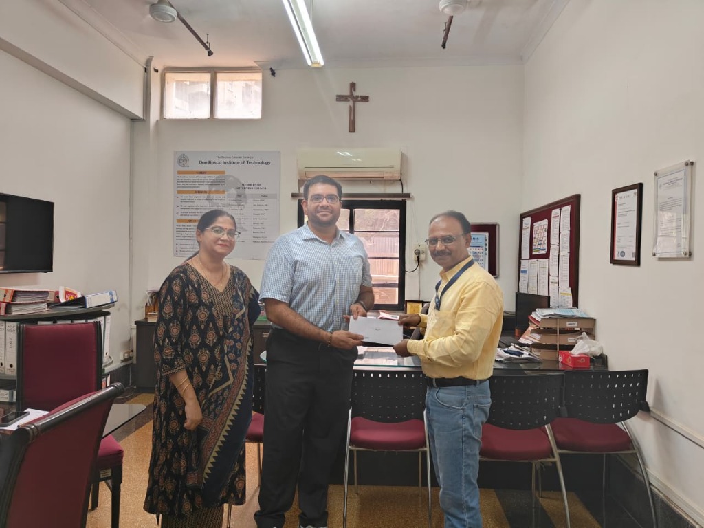 Felicitation of Mr. Amogh Warlikor by Principal Dr. Sudhakar Mande